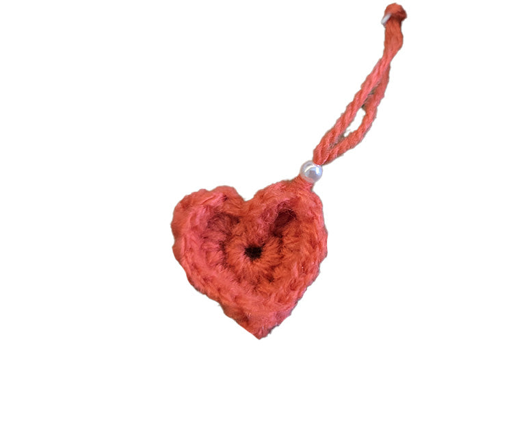 Trousse au crochet corail petit format