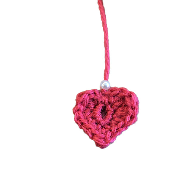 Trousse au crochet rose petit format