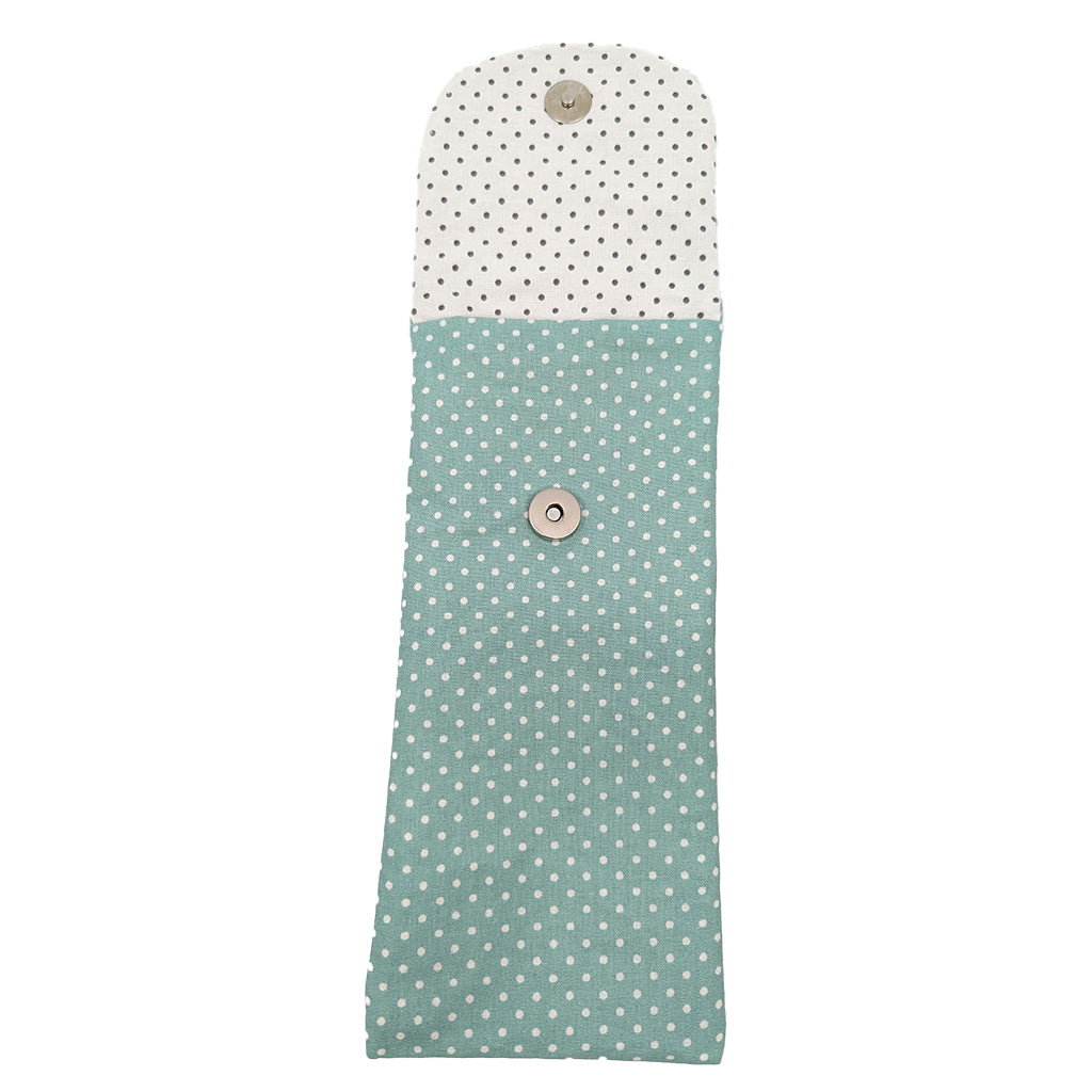 Etui à brosse à dents vert à pois blancs