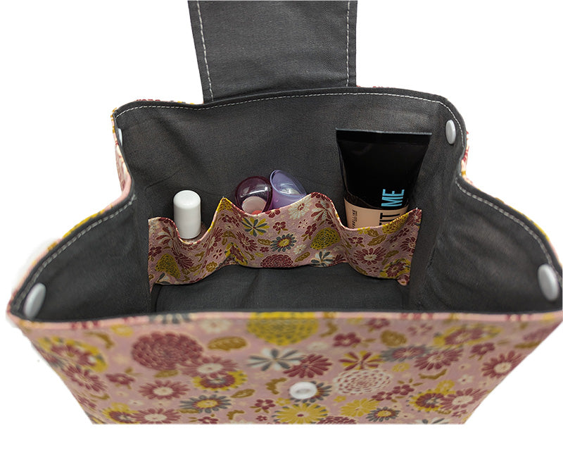 Trousse à grande ouverture rose à fleurs