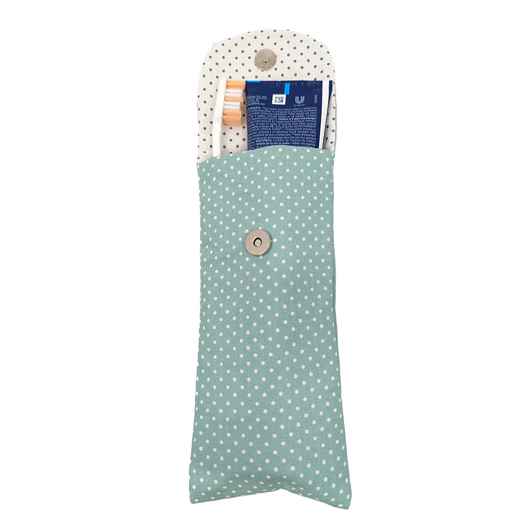 Etui à brosse à dents vert à pois blancs
