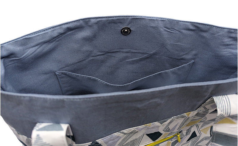 Sac bicolore pression aimantée "Lignes et triangles"