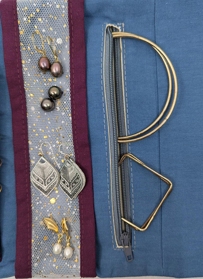 Pochette à bijoux de voyage fleurs prunes