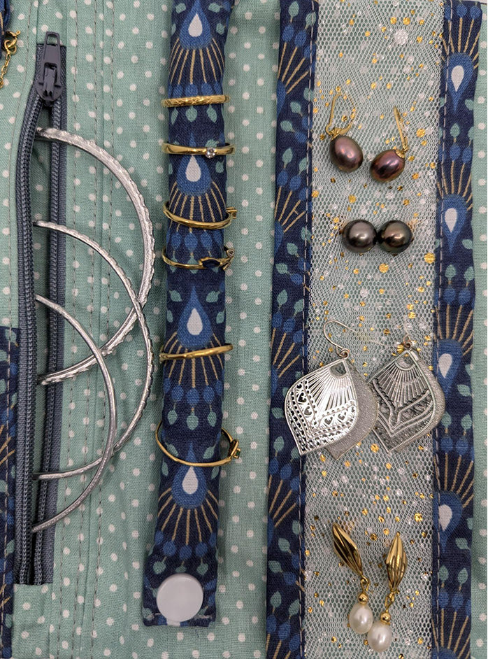 Pochette à bijoux de voyage paons bleus
