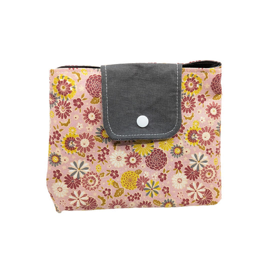 Trousse à grande ouverture rose à fleurs